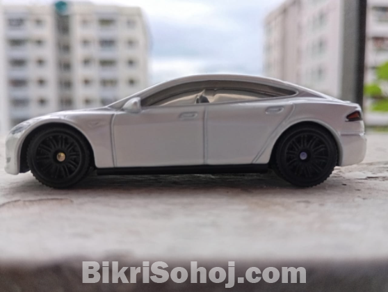 Hotwheels (Tesla Roadster), Matchbox (Tesla Model S)